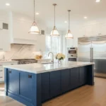 High-end transitional kitchen with white cabinets and navy blue island in a Plano home.