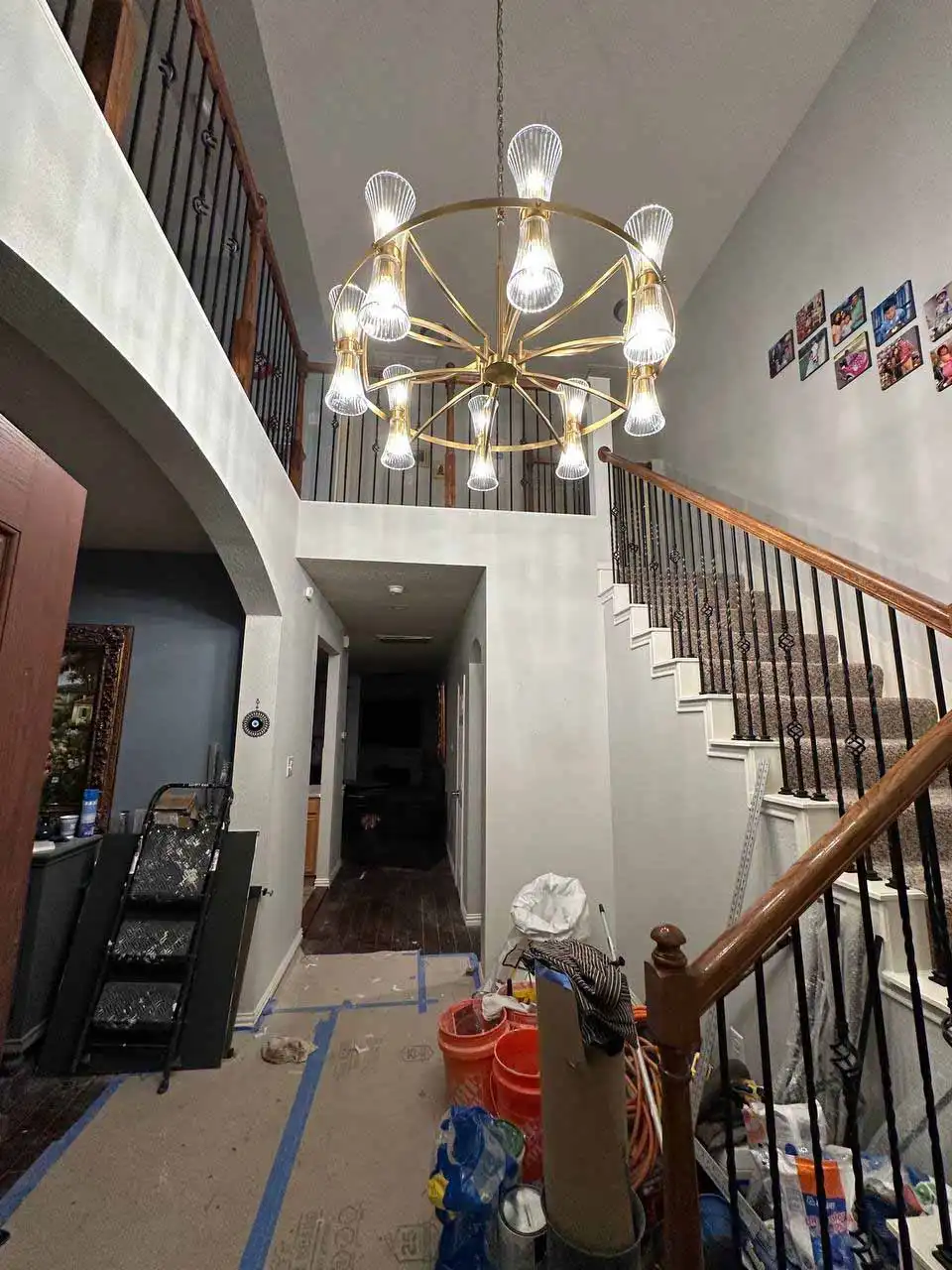 Custom stair railing installation during home renovation after