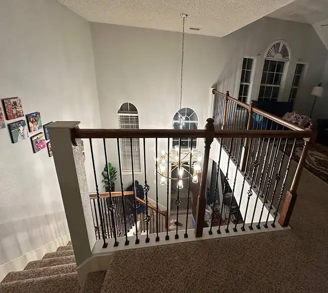Updated staircase with new railings and refinished steps