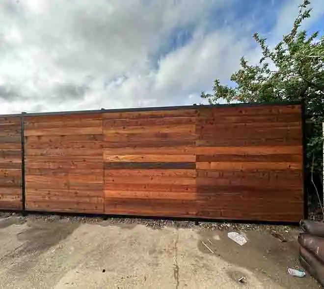 Modern commercial wooden fence installation with horizontal wood panels